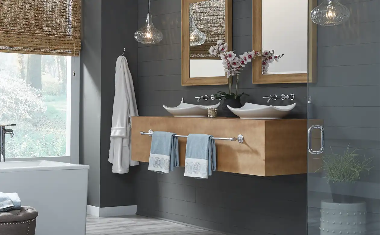 Grey modern bathroom design with double sinks. 